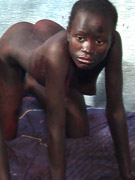 Petite blonde erotic chick reveal her shaved pussy and perky tits of tight black underwear.