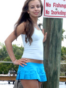 Exceptional fox in a white top and blue skirt sucks off a dude on a boat.