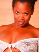 Curvy ebony freshie posing nude and in sexy clothes for you